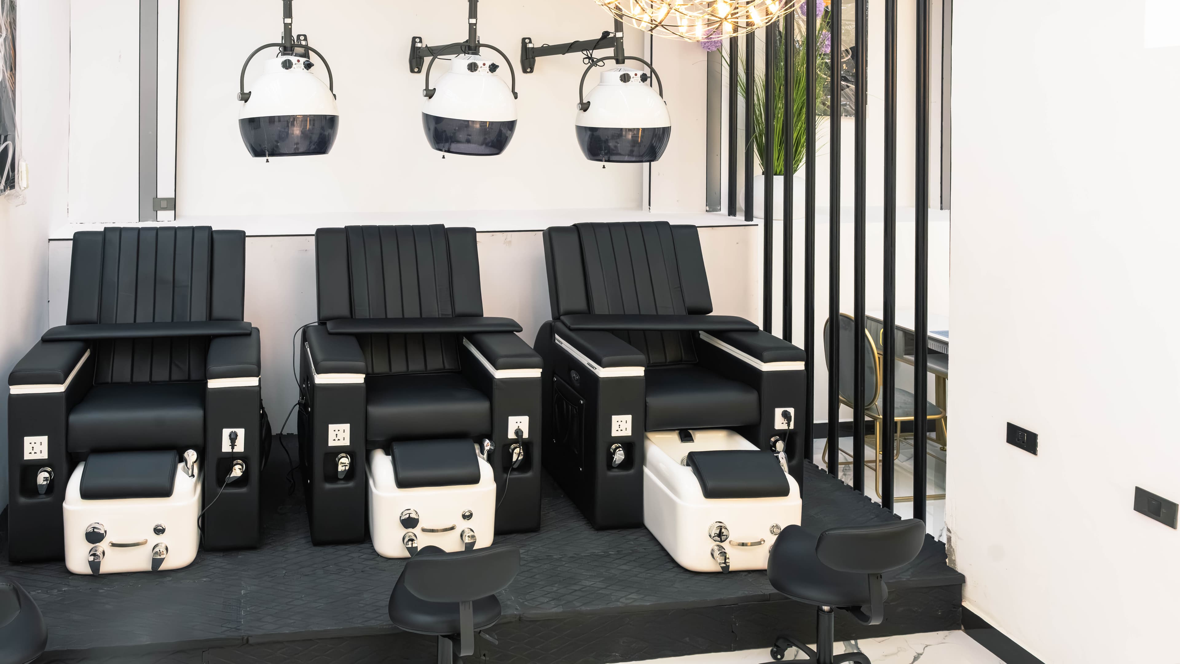 Pedicure lounge with three spa chairs