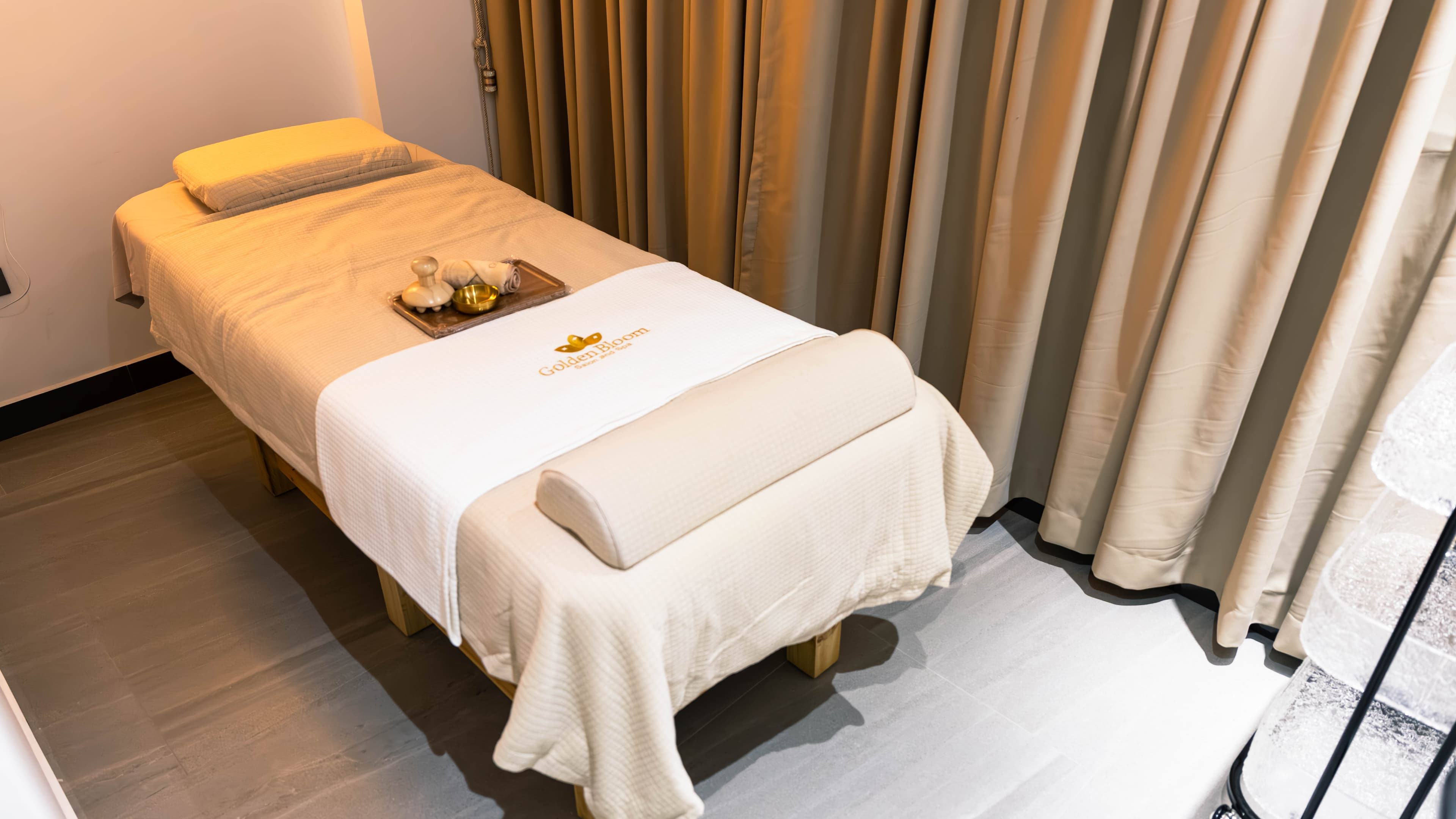 Massage bed prepared with fresh towels
