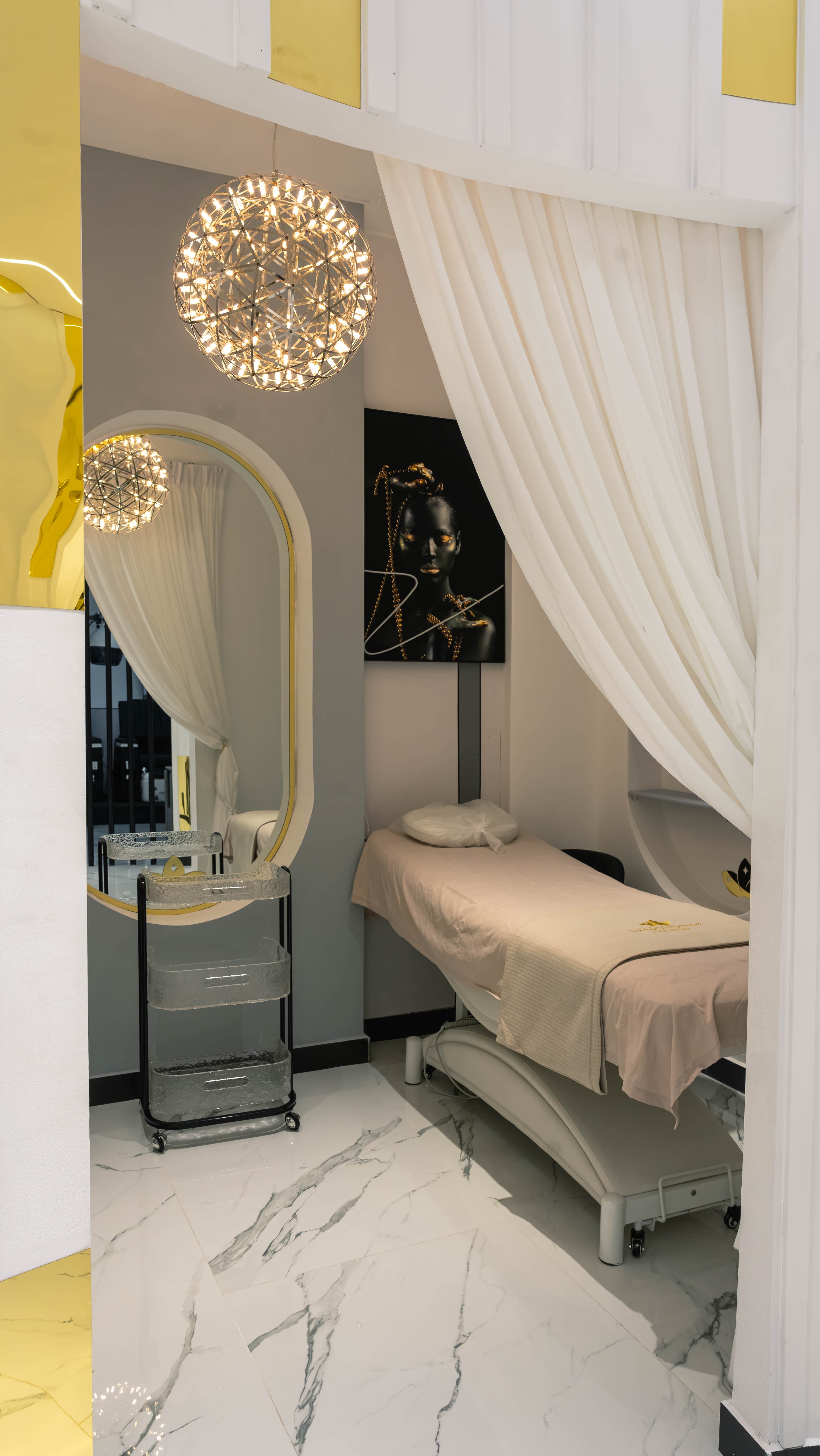 Treatment room seen through a draped doorway