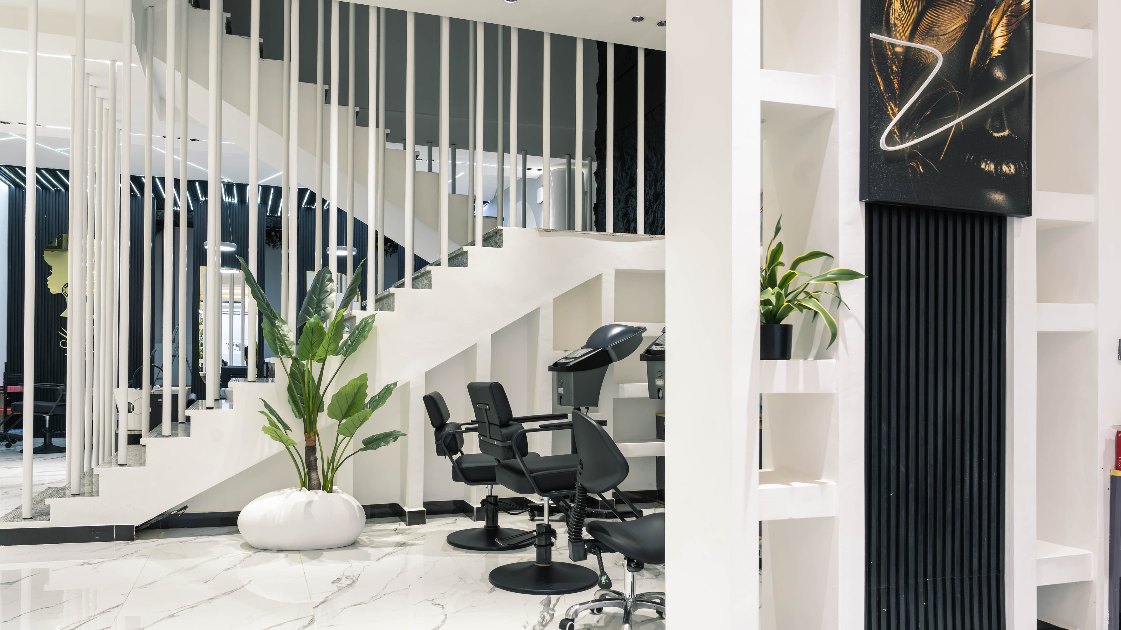 Staircase and styling chair beside the slatted wall
