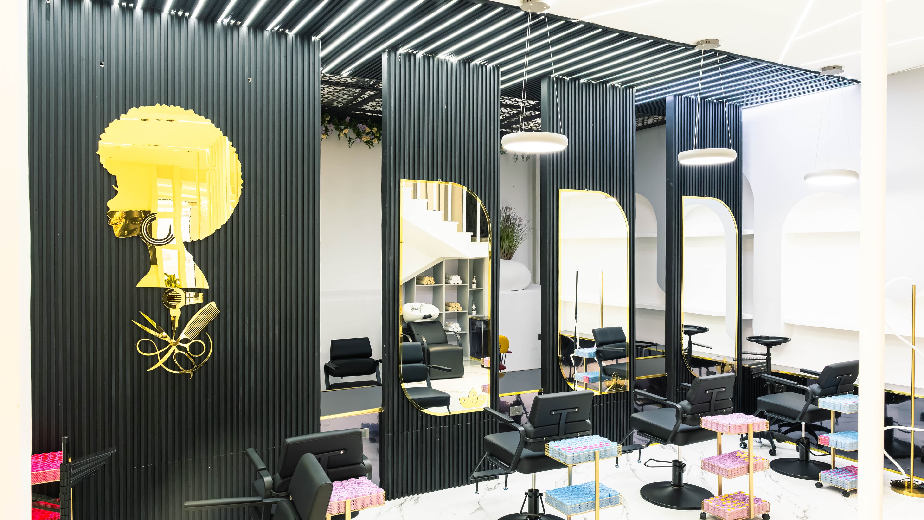 Pedicure chairs beneath the slatted ceiling